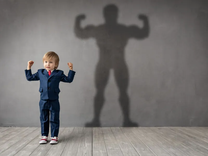 Child dreams of becoming a superhero Child dreams of becoming a superhero